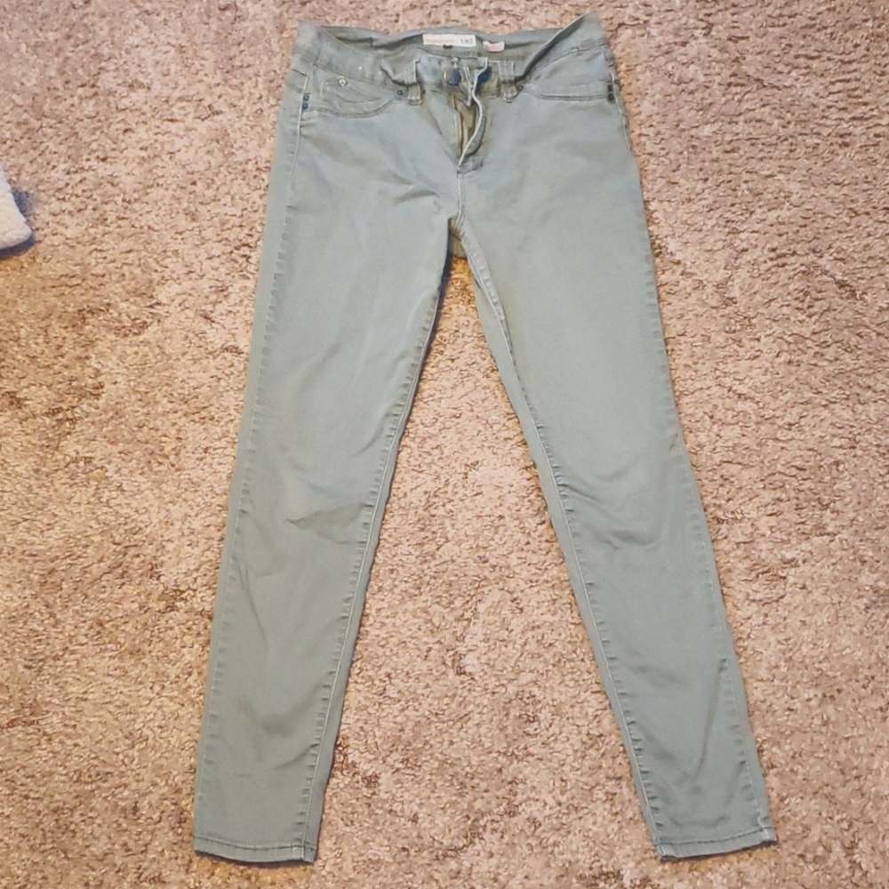 Military green skinny jeans